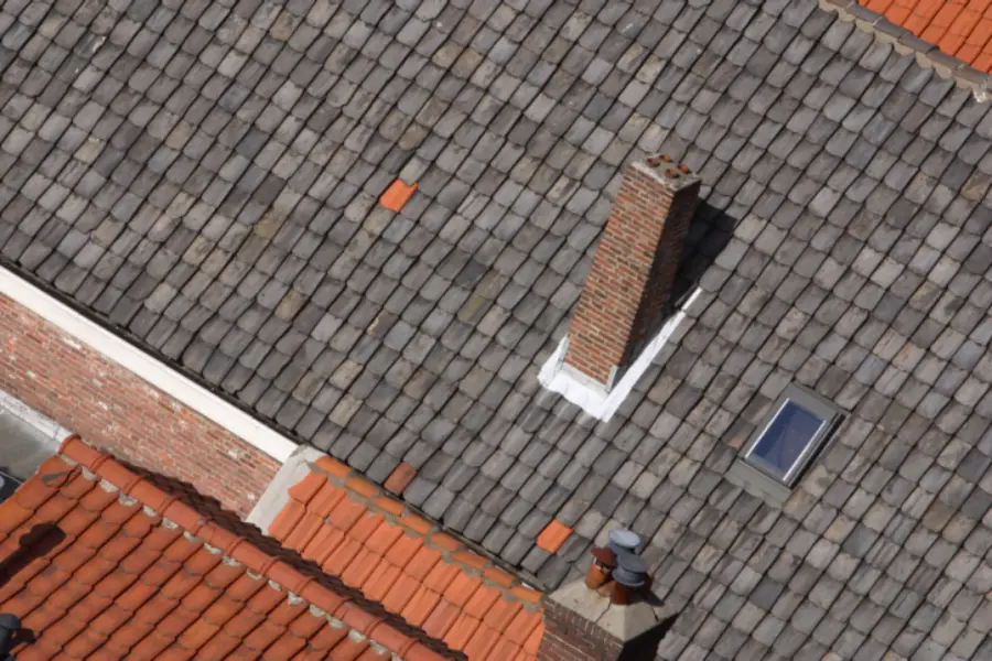 How Roofing Contractors Ensure Quality Asphalt Roof Installations in Topeka, KS